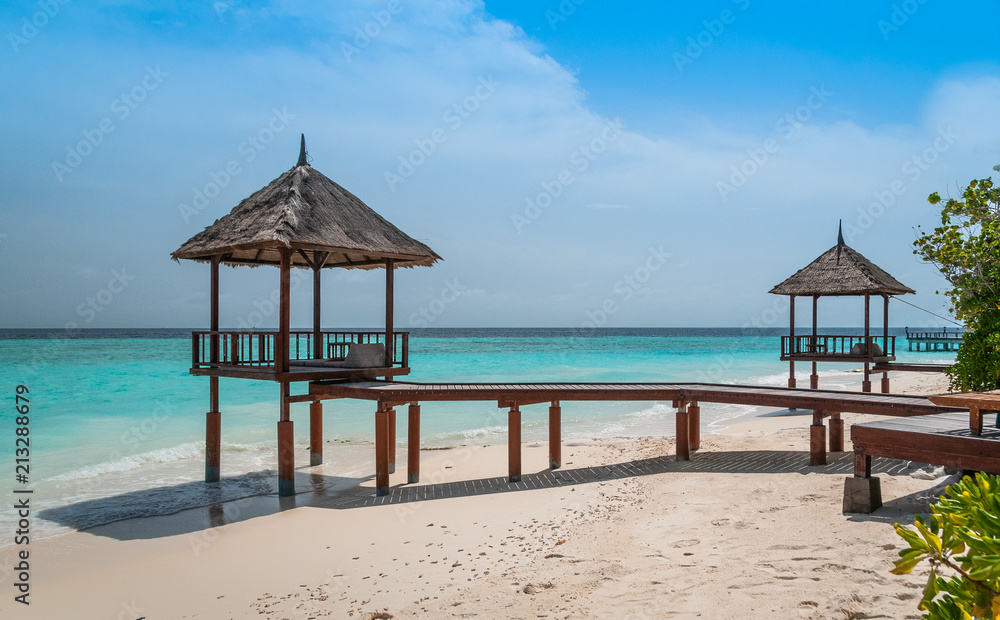 Fototapeta premium Luxury private pavilions on the beach. Honeymoon vacation