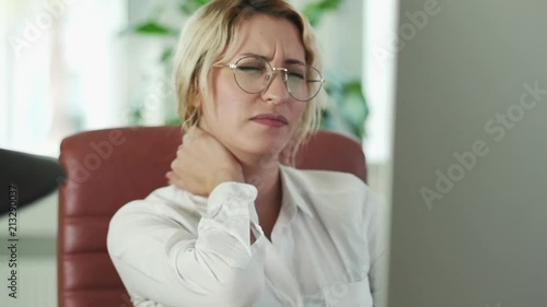 Neck Pain, Frustrated, Upset, Tense Business Woman with Headache in Office