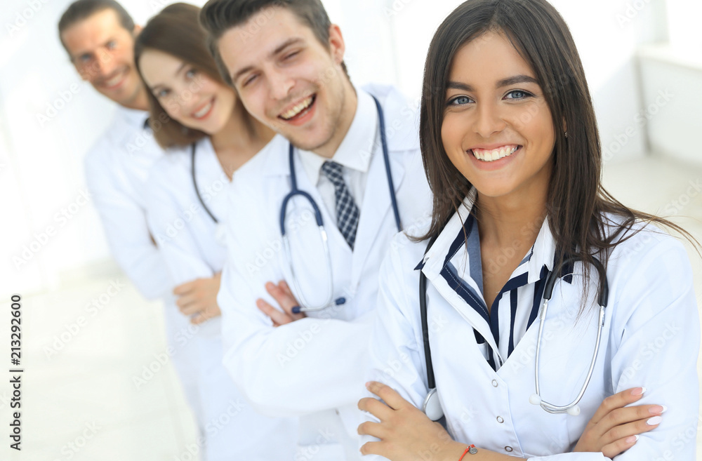 female doctor with group of happy successful colleagues female doctor with group of happy successful colleagues