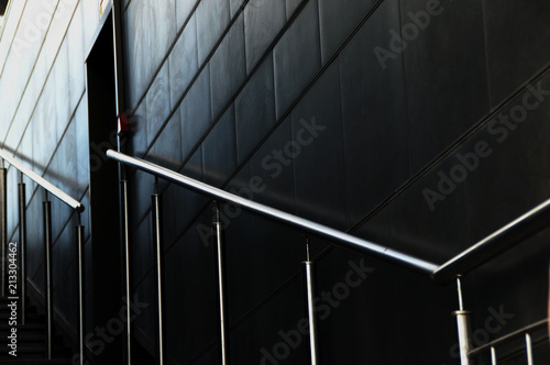 Bild auf Leinwand black wall rigor railing building entrance lift