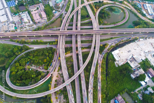 Aerial view traffic junction road with U turn lane city transport