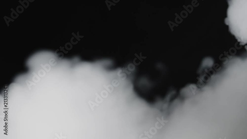 White smoke in front of black background photo