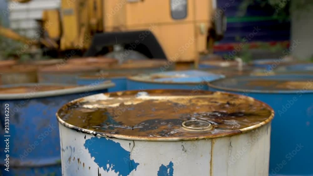 The oil is pouring on ld dirty barrels The oil is pouring on ld dirty barrels