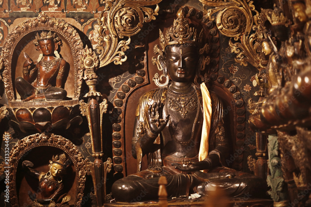 Fototapeta premium Buddhist statues in the temple tuibet