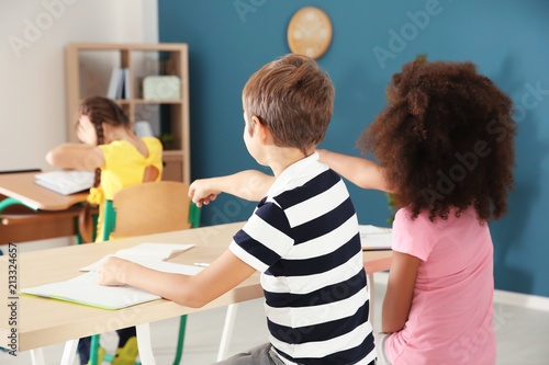 Children bullying little gi...