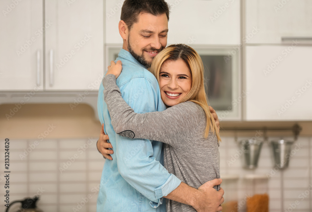 Portrait of happy couple in kitchen Portrait of happy couple in kitchen