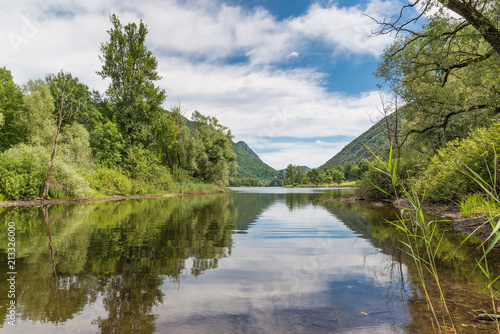 Beautiful natural Italian lake. Lake Ghirla  near the most known and big lakes Maggiore and Lugano in the province of Varese  not far from Milan. Frequented in the summer for the fresh climate