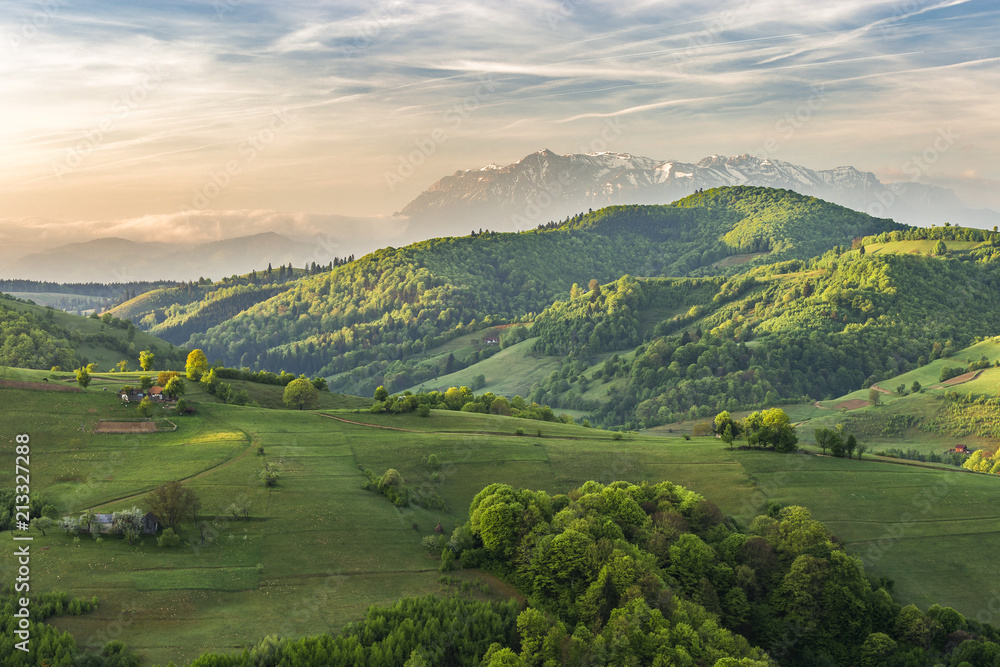 Fototapeta premium Beautiful sunrise over mountains and hills