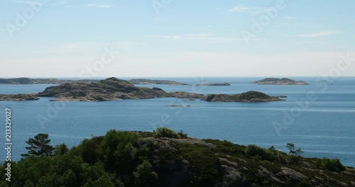 Wallpaper Mural A beautiful view of the ocean. In the horizon there are islands. The camera is panning. Torontodigital.ca