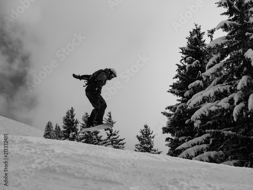 jumping snowboarder