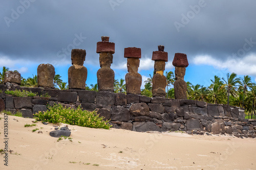 Anakena palm beach and Moais statues site ahu Nao Nao, easter island photo