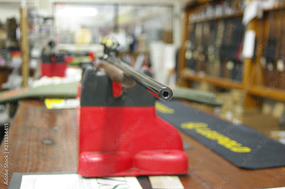 Guns, Firearms and hunting Rifles on display to be sold at a gun shop in a rural farming community in New South Wales, Australia Guns, Firearms and hunting Rifles on display to be sold at a gun shop in a rural farming community in New South Wales, Australia