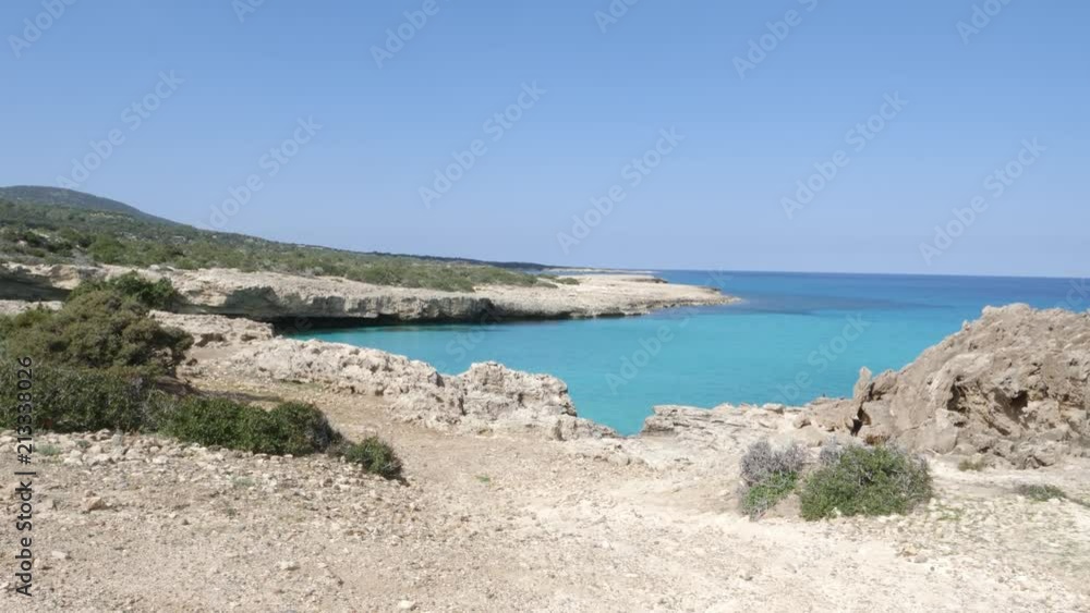 View from the shore of a crystal clear lagoon in a tropical paradise View from the shore of a crystal clear lagoon in a tropical paradise