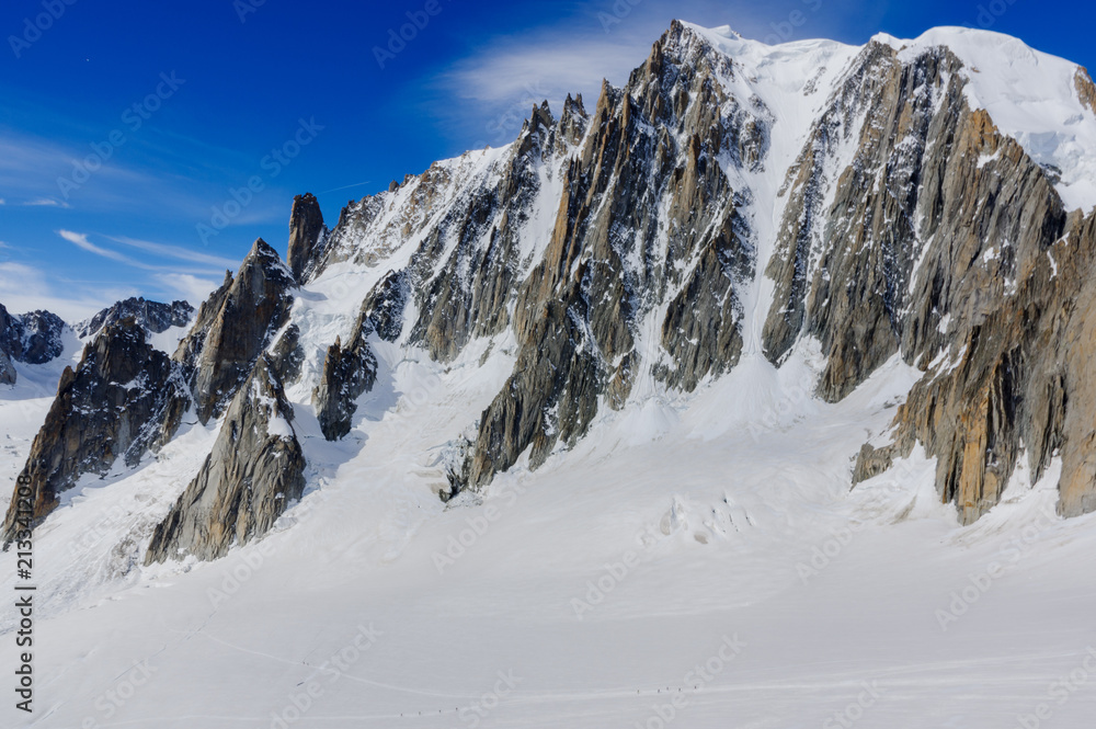 Sharp Peaks, Steep wall and Alpinist in Chamonix Sharp Peaks, Steep wall and Alpinist in Chamonix