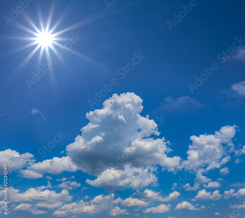 blue sky with clouds and sparkle sun  natural background