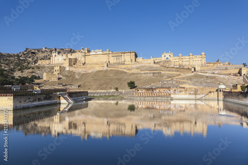 beautiful amber fort with reflection in lake