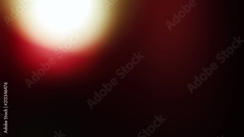 Natural energetic warm red and yellow light leak background or overlay.