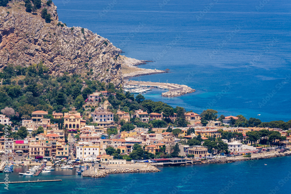 View of the seaside resort town of Mondello in Palermo, Sicily. White beach and turquoise crystal clear sea. HD View of the gulf from the top of Monte Pellegrino.