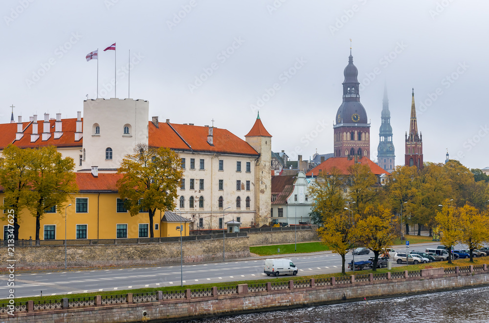 View on historical district of old Riga city 
that is the capital of Latvia and famous Baltic city widely known among tourists due to its unique medieval and Gothic architecture
