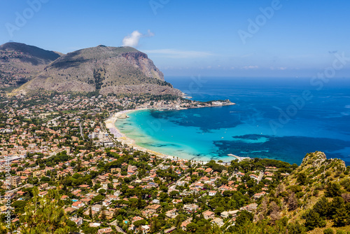 Panoramic view of the seaside resort town of Mondello in Palermo, Sicily. White beach and turquoise crystal clear sea. HD View of the gulf from the top of Monte Pellegrino. photo