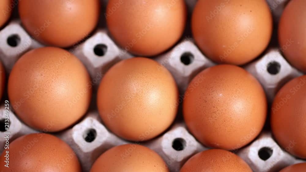 Uncooked eggs. Rotating and closeup