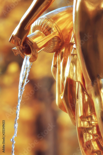 fountain peterhof autumn / landscape in the park peterhof fountains in the autumn season