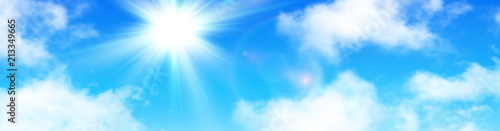 Sunny background, blue sky with white clouds and sun