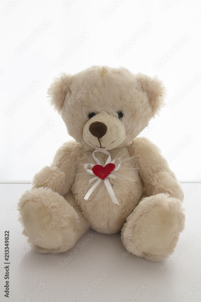 Soft baby toy bear on light background