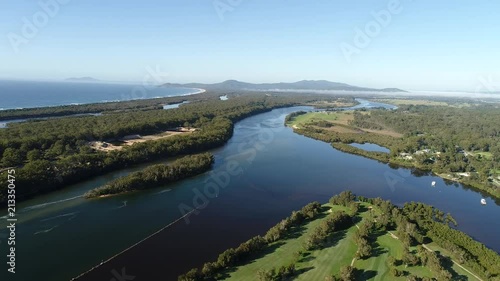 Wallpaper Mural Flat island in delta of Nambucca river part of Nambucca Heads regional town recreational infrastructure with local golf course on a sunny morning.
 Torontodigital.ca