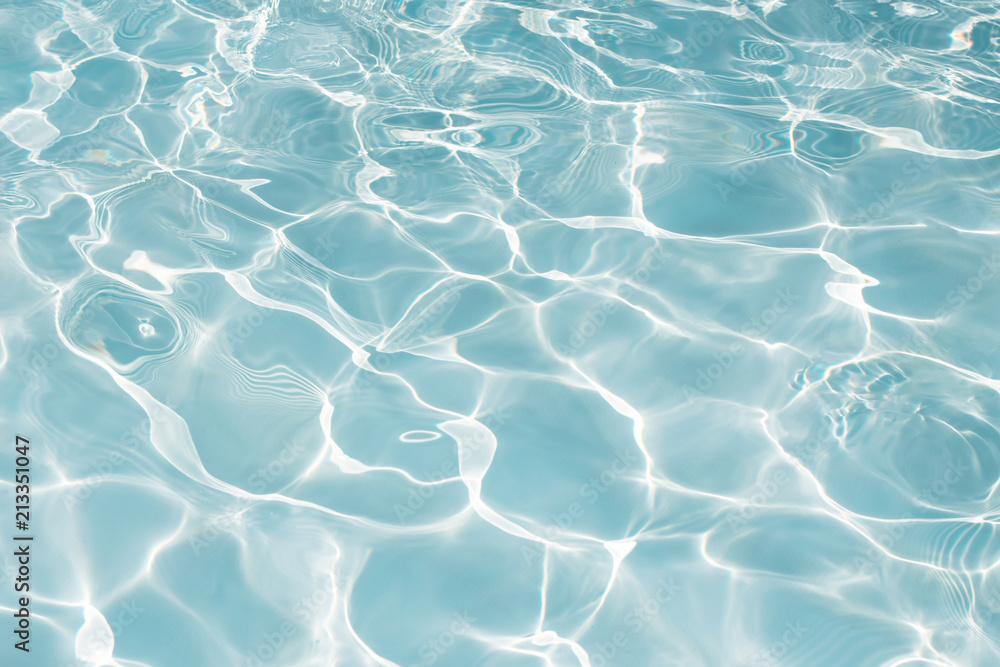 Fototapeta premium Texture of water in swimming pool for background
