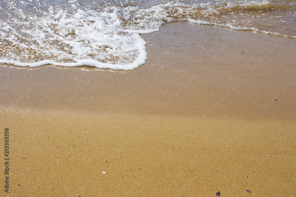 Soft wave of the sea on the sandy beach Soft wave of the sea on the sandy beach