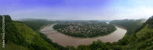Photo of Zaleschiki - the city, Zaleschitsky district, Ternopil region, Ukraine. Panoramic view in the foggy morning