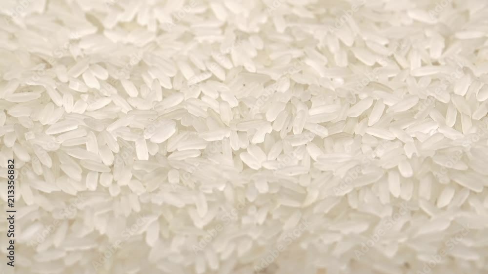 UHD macro of the white rice on a rotating stand UHD macro of the white rice on a rotating stand