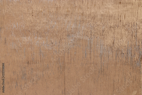 Closed up of flaking color wood plank's texture background.
