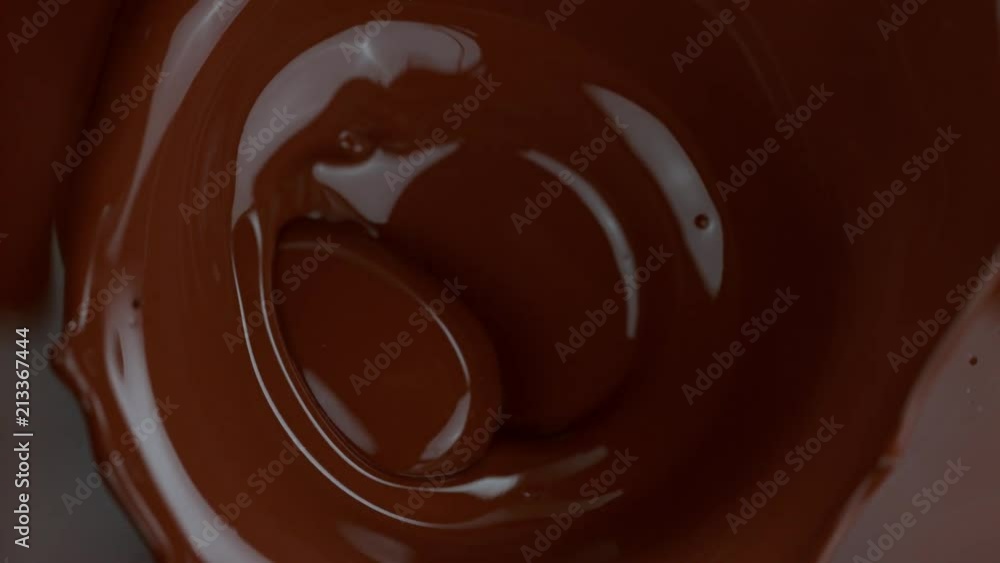 Pouring meldet chocolate. Shoot on Digital Cinema Camera in super slow motion, 1000fps. Pouring meldet chocolate. Shoot on Digital Cinema Camera in super slow motion, 1000fps.