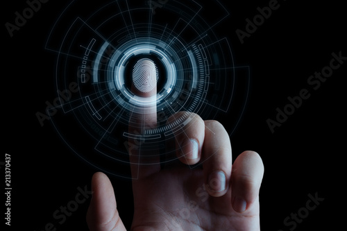 Fingerprint scan provides security access with biometrics identification. Business Technology Safety Internet Concept photo