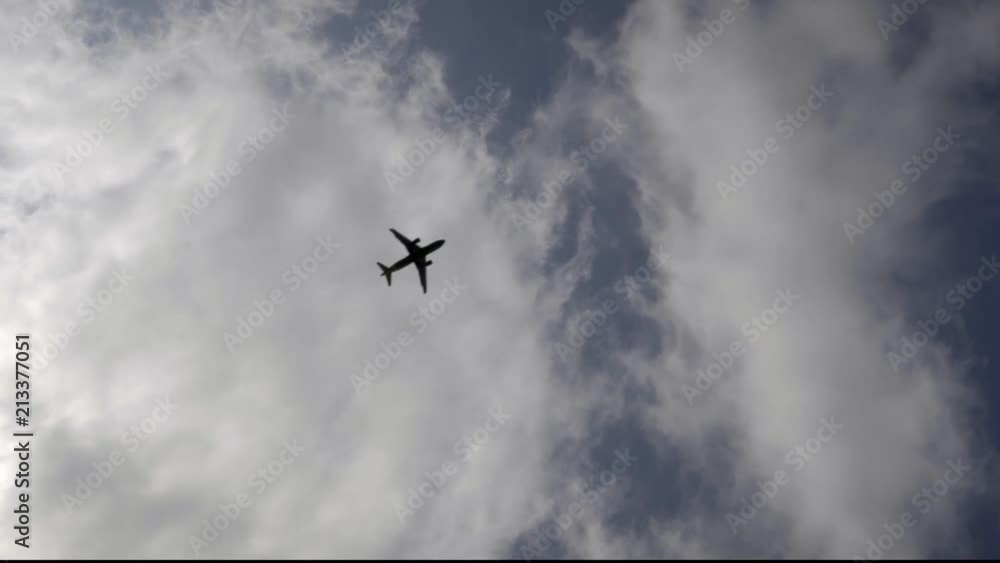 The plane flies against the sky from corner to corner of the frame.
The plane flies against the sky from corner to corner of the frame.