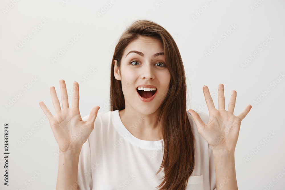 Calm down, everything is okay, no need to cry. Portrait of worried pleasant female friend holding raised palms and smiling nervously, trying to comfort upset girlfriend, going crazy cause of breakup Calm down, everything is okay, no need to cry. Portrait of worried pleasant female friend holding raised palms and smiling nervously, trying to comfort upset girlfriend, going crazy cause of breakup