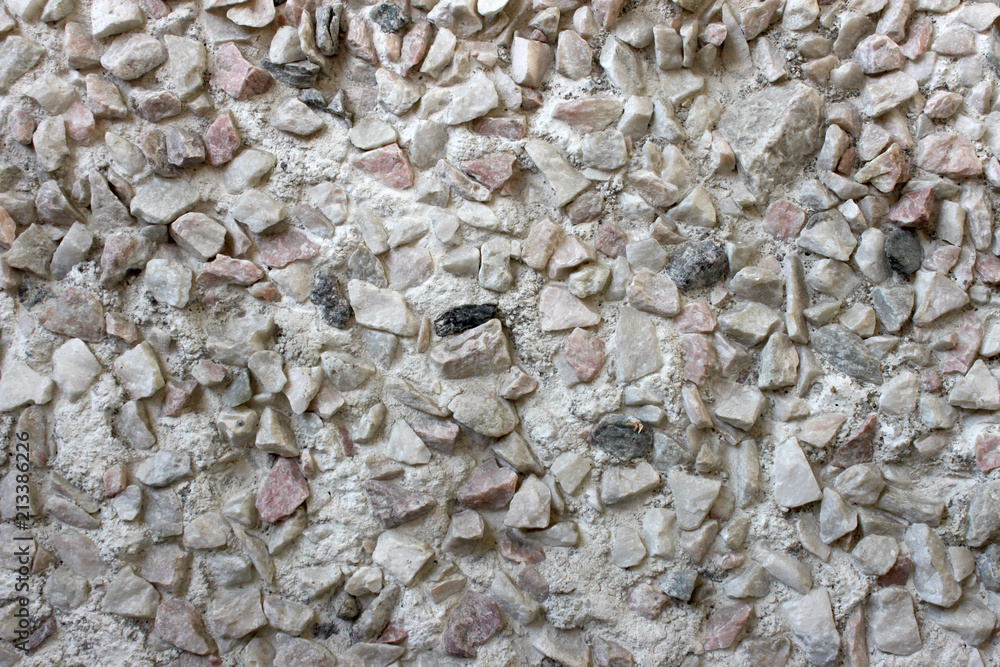 concrete wall with stones