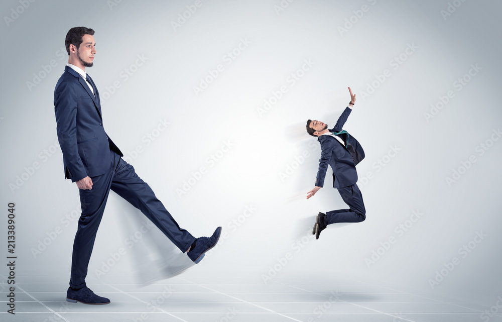Young businessman fired cruel and aggressive by his boss with white background
Young businessman fired cruel and aggressive by his boss with white background