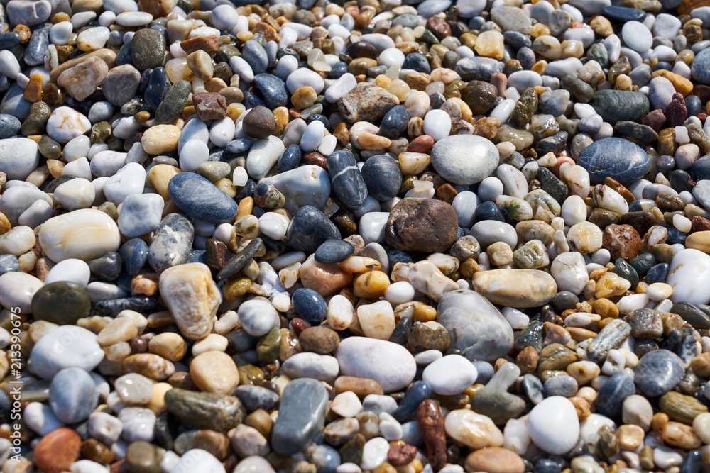 Pebbles on the beach as a natural background. Pebbles on the beach as a natural background.