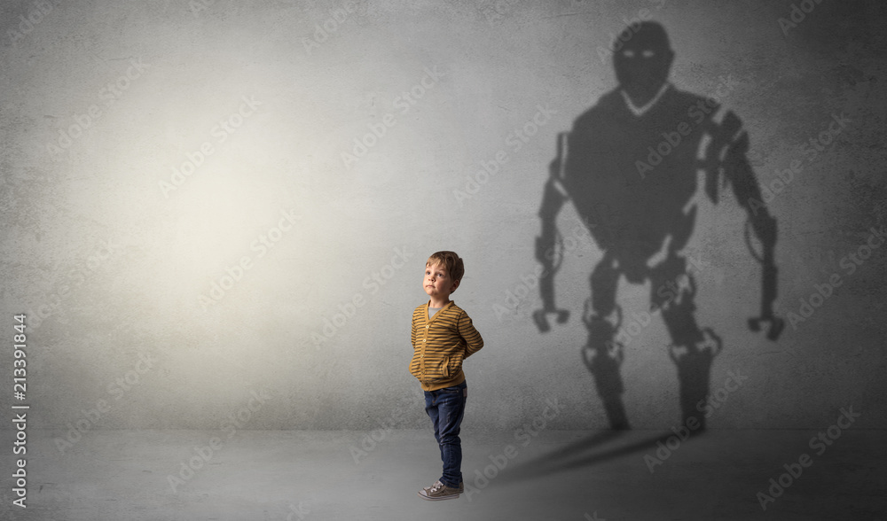 Little boy s self image appear as a big robotman shadow on his background
Little boy s self image appear as a big robotman shadow on his background