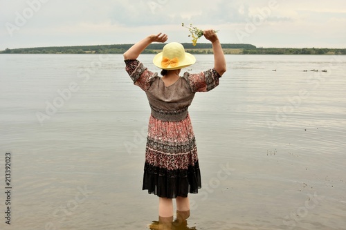a woman by the lake
