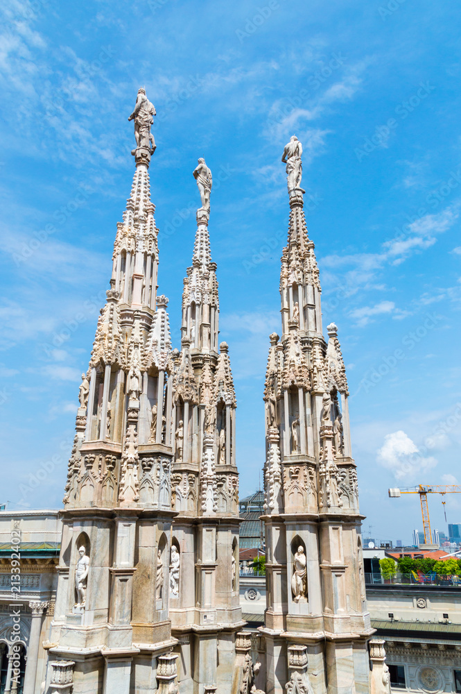 Sculptures on the roof of Duomo di Milano in Milan, Italy.