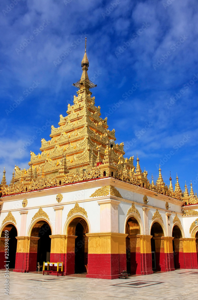 Mahamuni Pagoda on a blue sky day in Mandalay, Myanmar Mahamuni Pagoda on a blue sky day in Mandalay, Myanmar