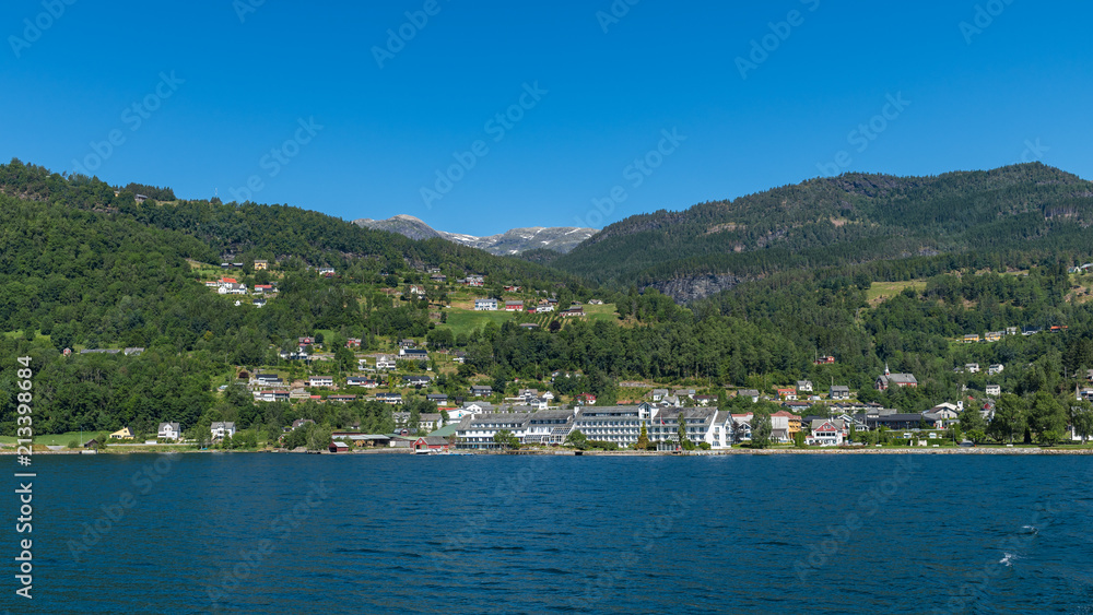Panorama of the village of Ulvik from fjord. National park Hardangervidda, Norway, Europe.
