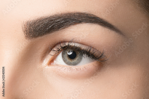 Young woman with permanent eyebrows makeup, closeup