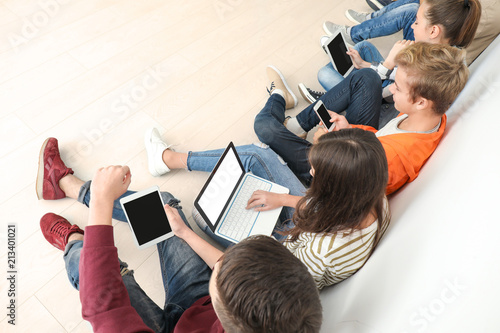 Group of teenagers with mod...