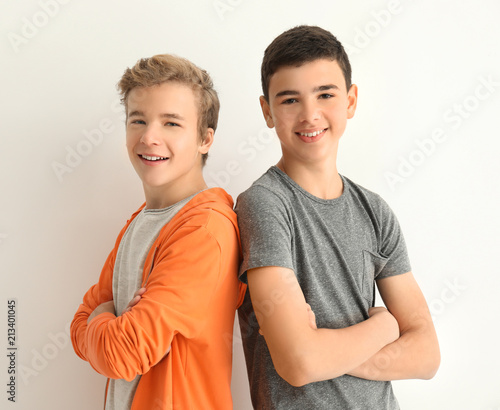 Cool teenage boys on white ...
