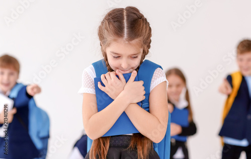 Children bullying their cla...